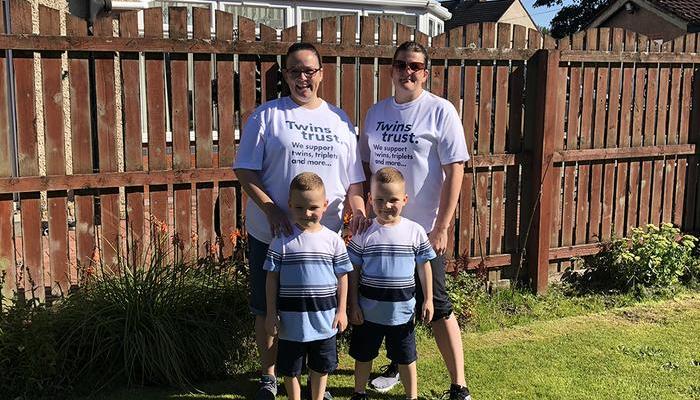 Christopher and Alyson Kirkland with their identical twins George and Archie