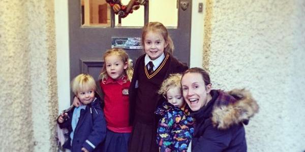 Mum with children  ready to go to school