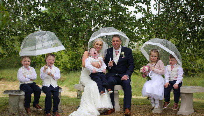 Rebecca and Barrie Thomson with their daughter Olivia and quadruplet boys