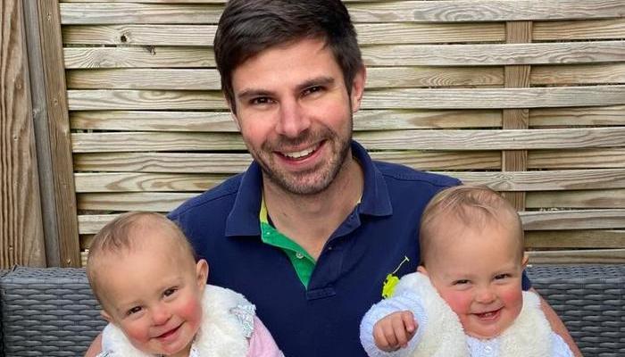  Adam Wilkinson with identical twin girls