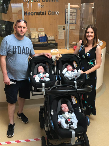 Chris and Vanya Jenkin's with their identical triplet boys.