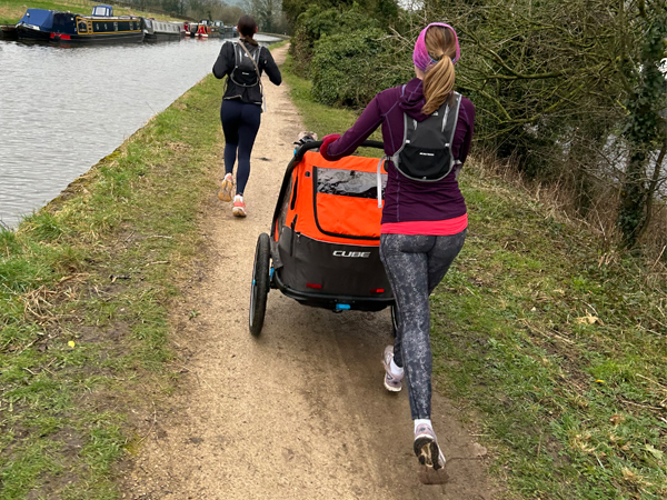 Eliza and her sister Imogen on a training run with Eliza's twin boys