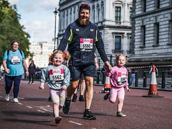 Ben with his twin girls completing the London Marathon