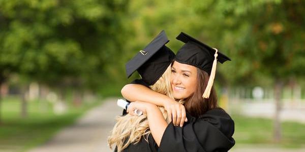 Twins graduating from university